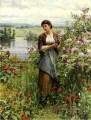 Julia entre las Rosas paisana Daniel Ridgway Knight Flowers